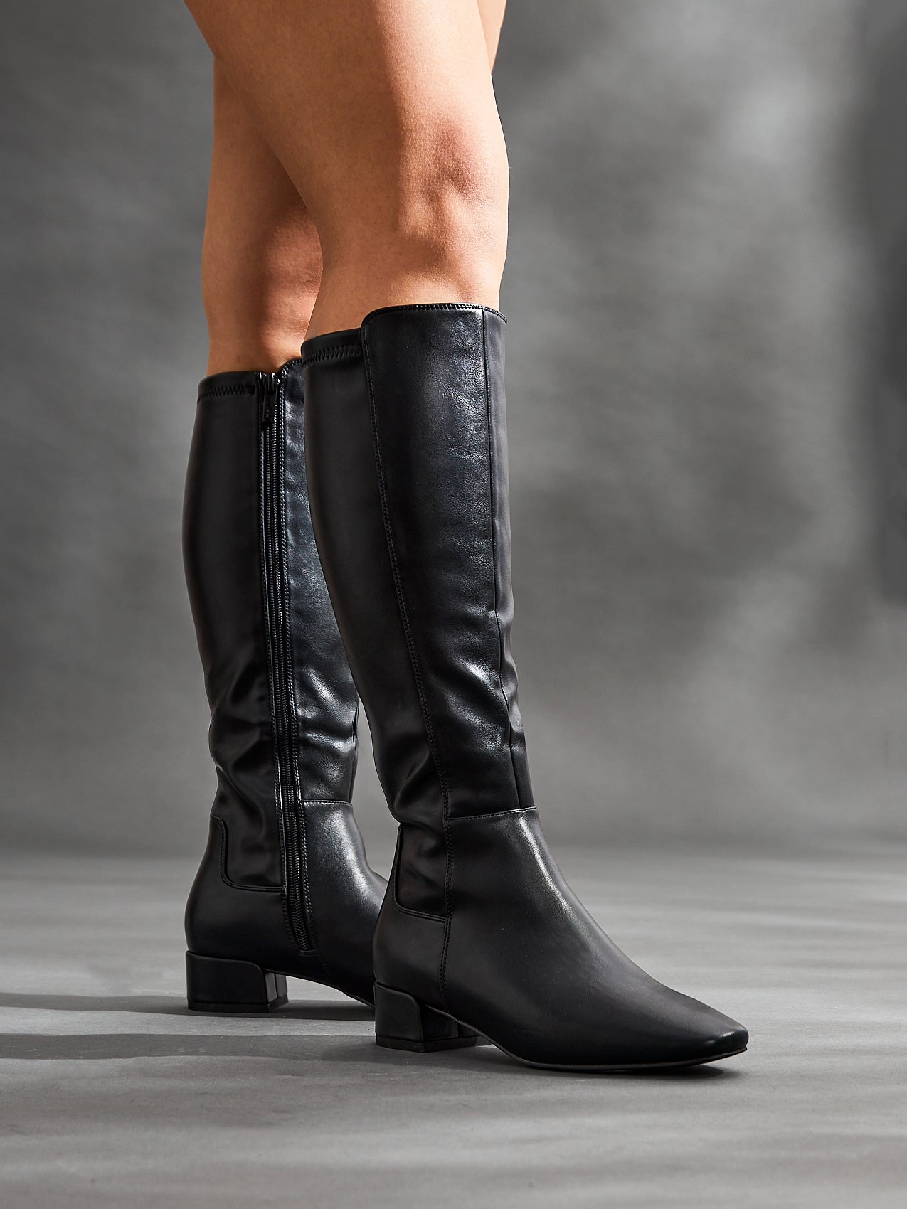 Revolve Black Faux Leather Block Heel Long Boots