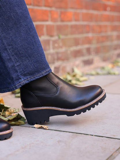 Trish Black Faux Leather Wedged Ankle Boots