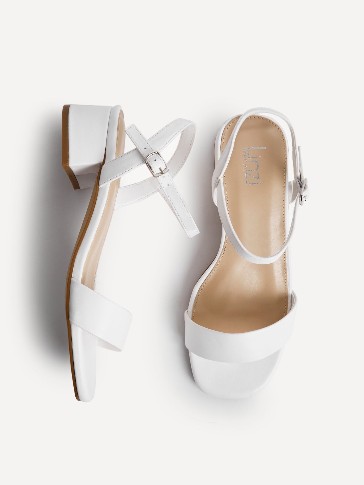 Carlie Wide Fit White Faux Leather Low Heels