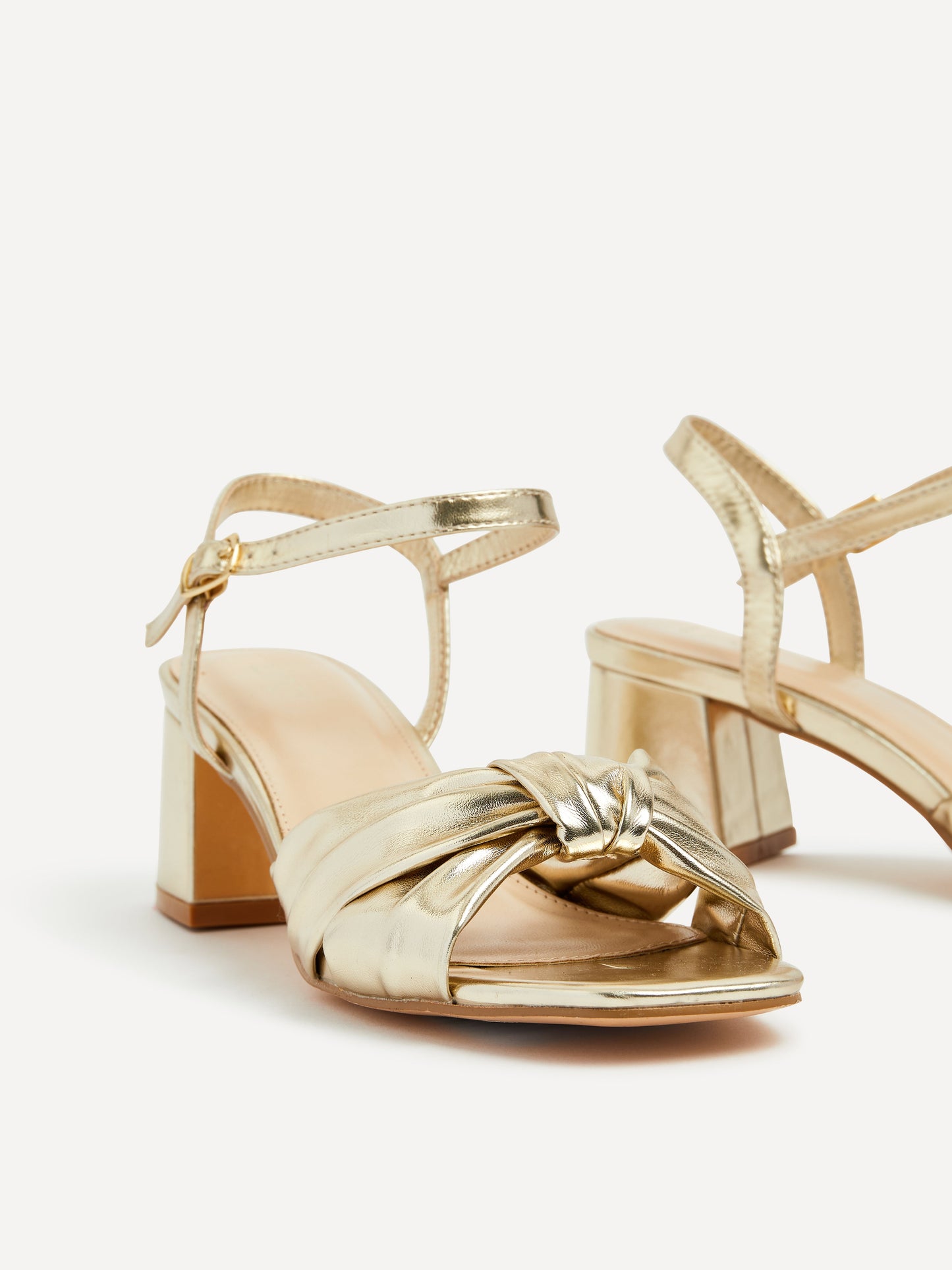 Charlotte Gold Faux Leather Knotted Heels