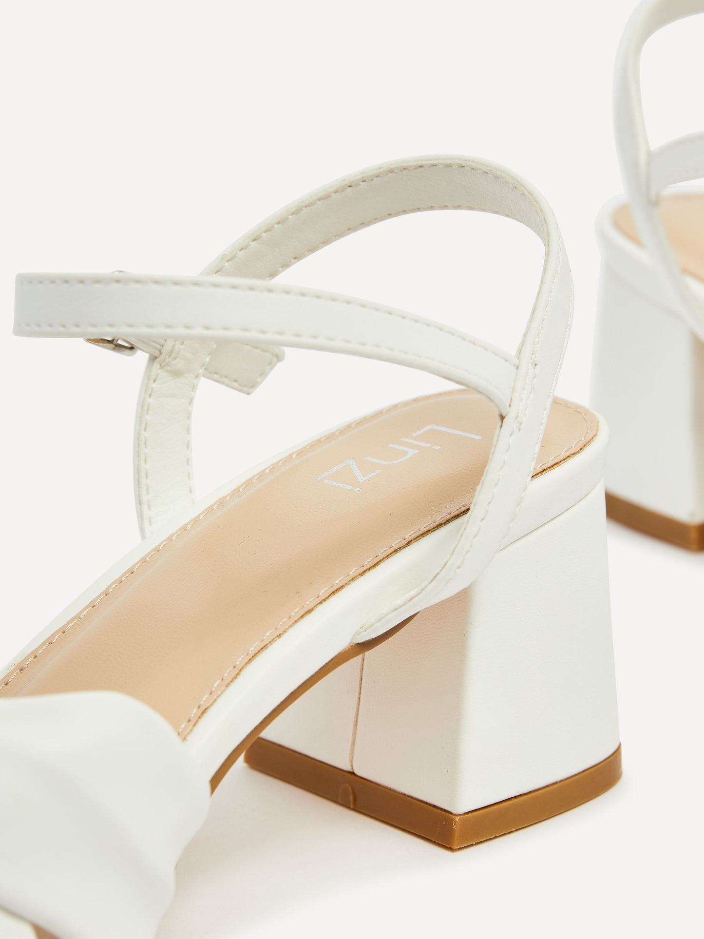 Charlotte White Faux Leather Knotted Heels