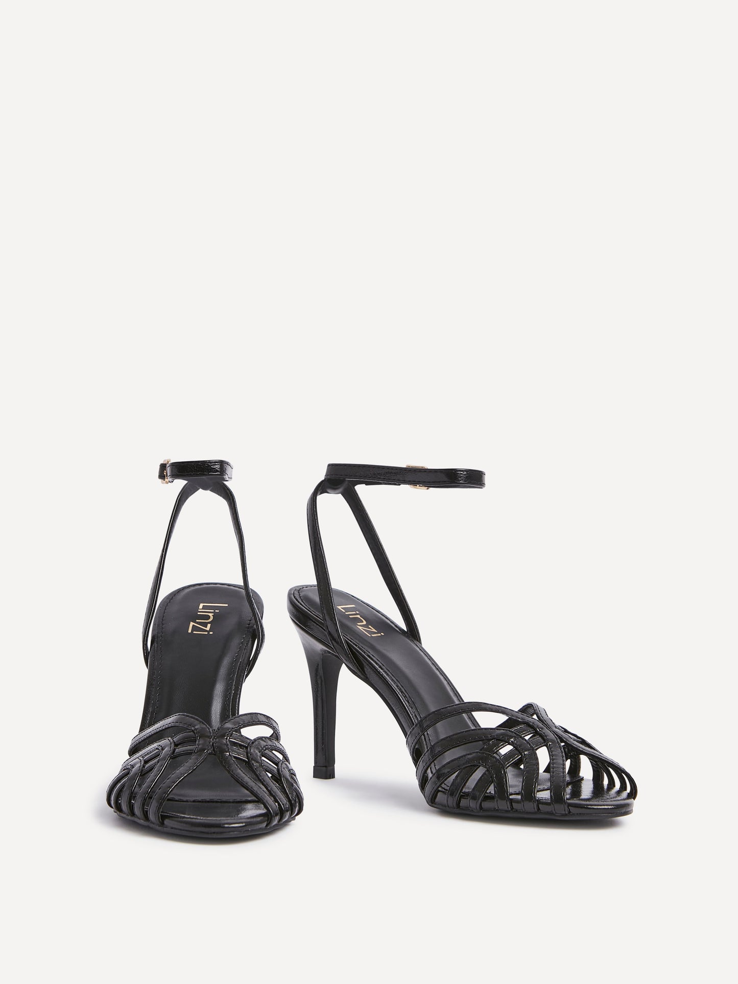 Eros Black Faux Leather Caged Heels