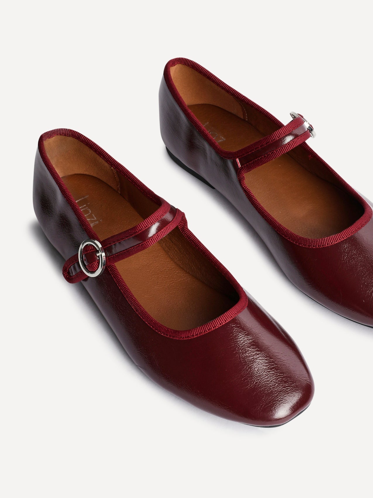 Graceful Burgundy Faux Leather Ballet Pumps