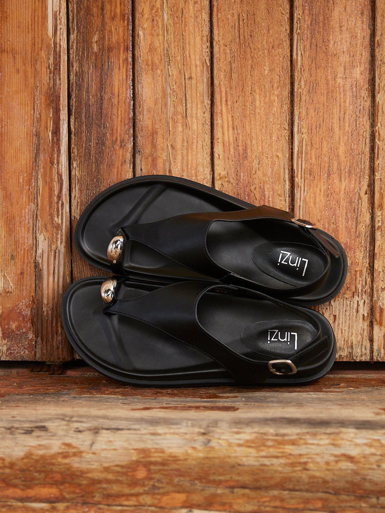 Latch Black Toe Ring Flat Sandals