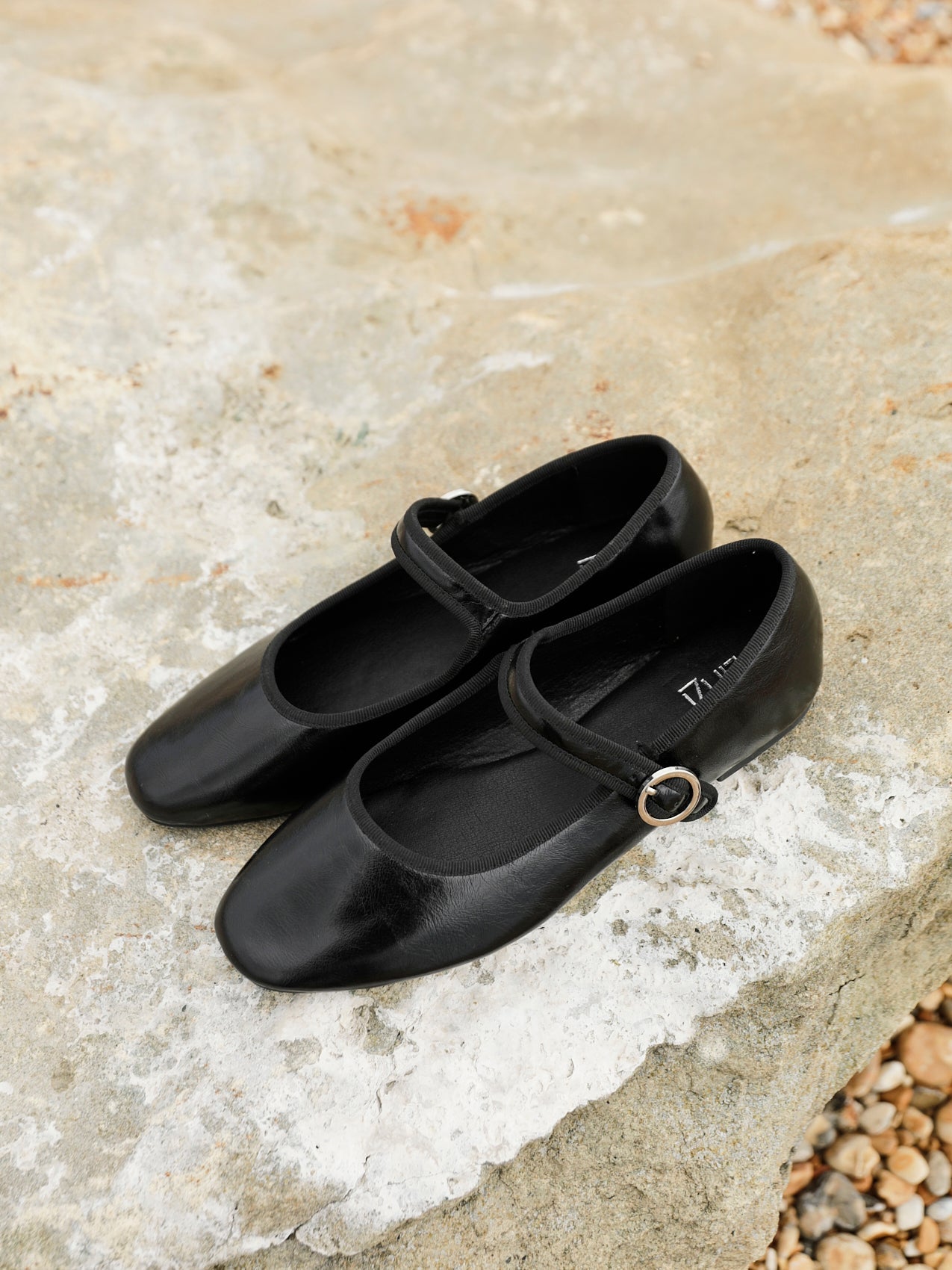 Graceful Black Faux Leather Ballet Pumps