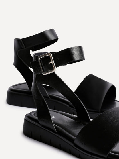 Nora Black Faux Leather Flat Sandals