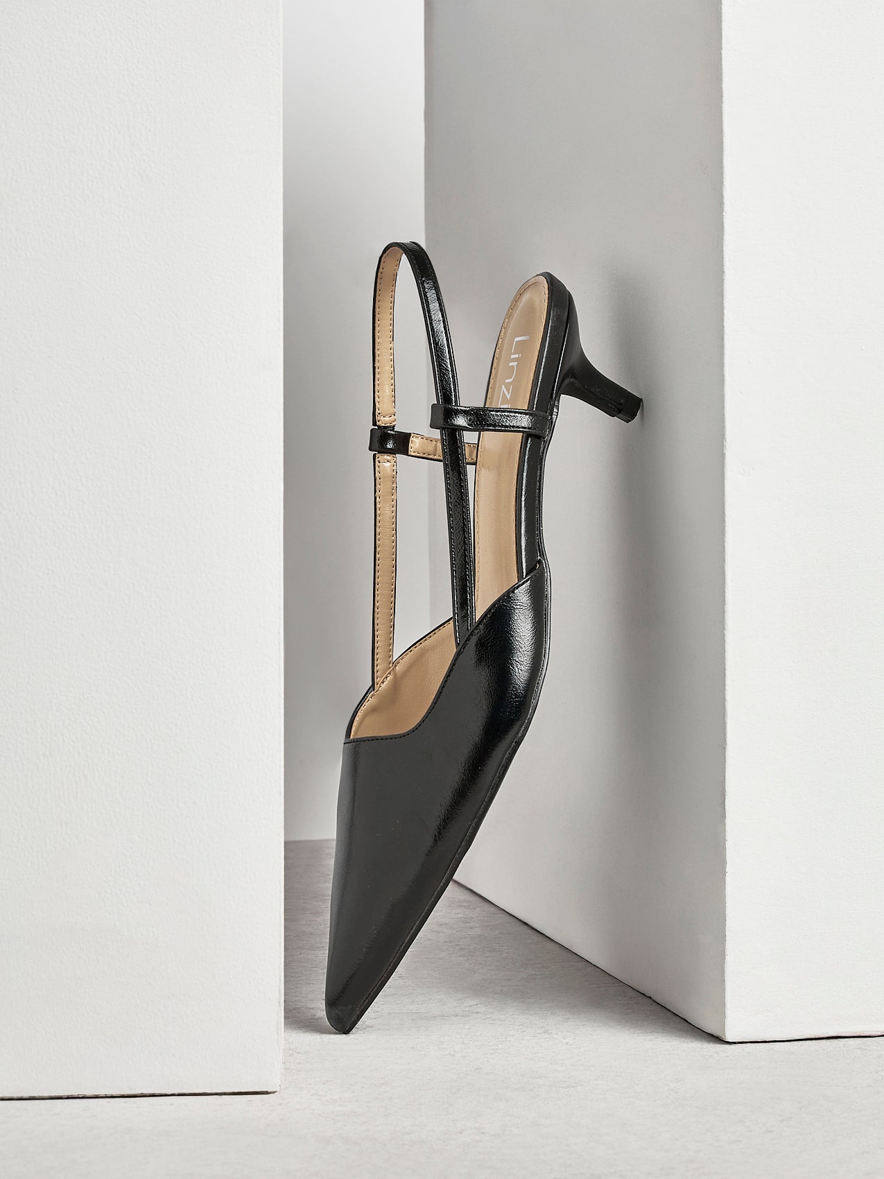 Refined Black Slingback Kitten Heels