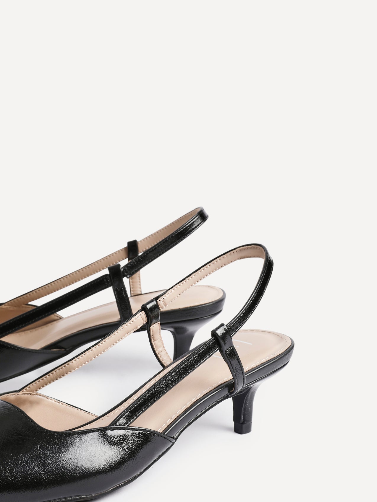 Refined Black Slingback Kitten Heels